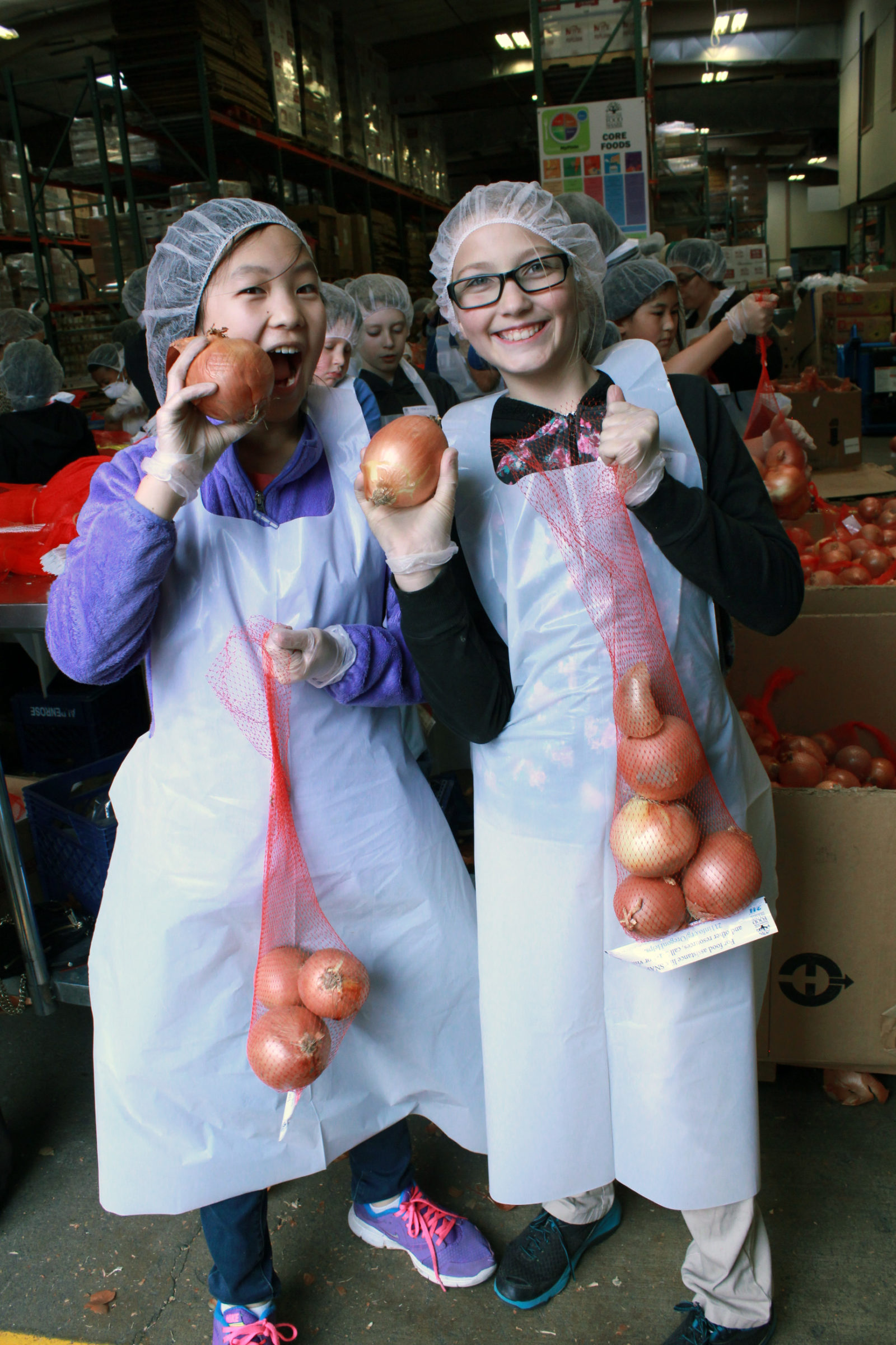 Livingstone Students packing onions at Marion Polk Food Share