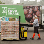 Zimmer, a driver with Marion Polk Food Share, delivers a load of food to the wildfire evacuation point at Oregon State Fairgrounds on Sep. 14. The Food Share provided 20,000 pounds of food for those sheltering at the Fairgrounds after wildfires swept through Santiam Canyon and surrounding areas.