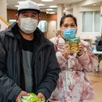 Santauo, left, and Kapiolani shop for food at a mobile distribution hosted in partnership with Micronesian Islander Community at Chemeketa Community College.