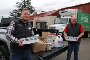 featured Partner Capitol Auto Group with donated food items